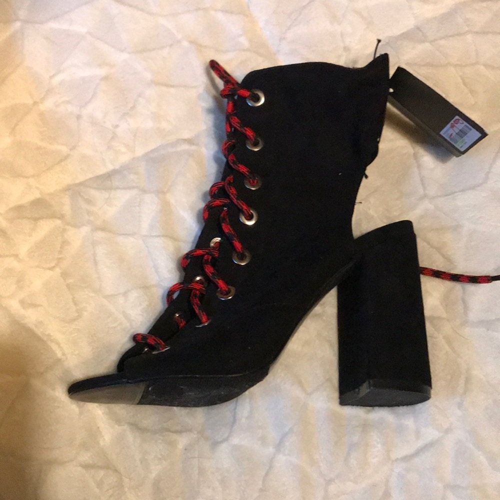 Brand new black open heal lace up heels